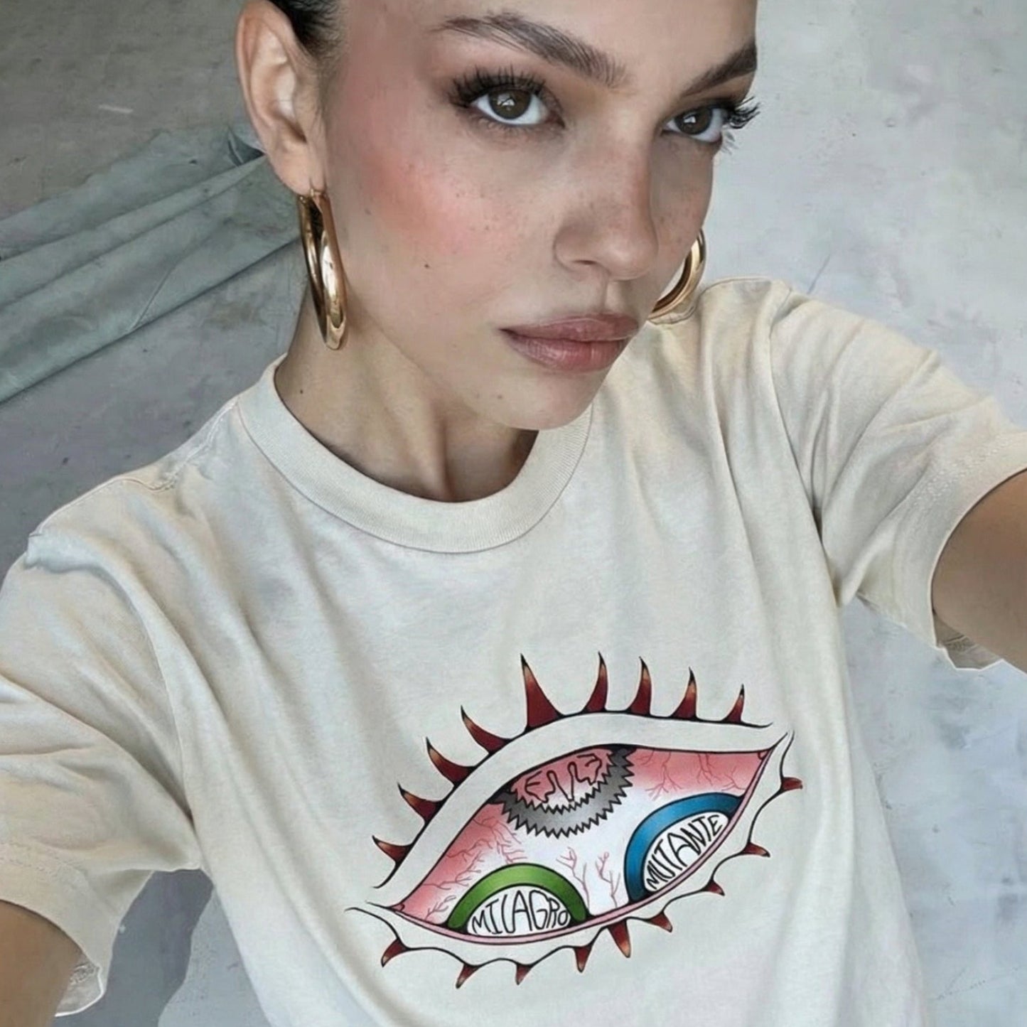 Camiseta oversize con efecto desgastado Con el EYE Milagro